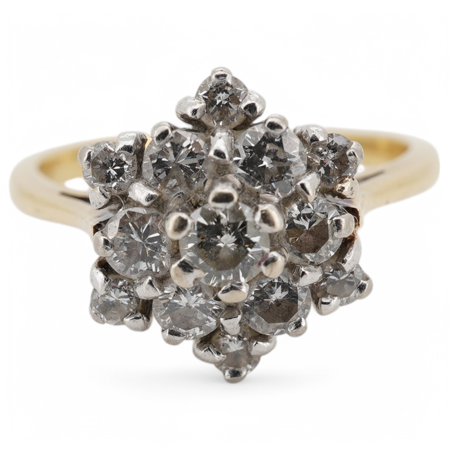 A yellow metal (stamped 18ct) and diamond set flower head cluster ring, size M, gross weight 4.1 grams. Condition - fair to good